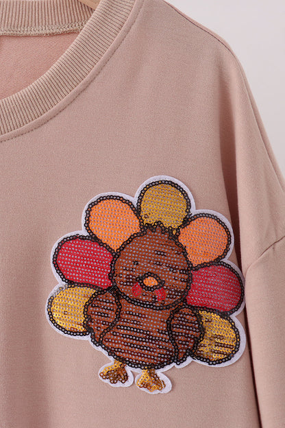 Khaki turkey sequin mom top